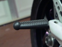 Rear peg