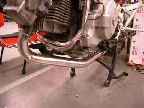 Staintune header OEM cans with center stand