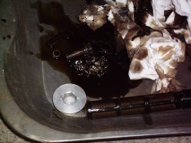 metal in drained oil