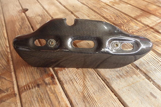 Carbon fibre exhaust guard