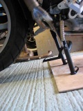 Cat by-pass pipe - centre stand stop