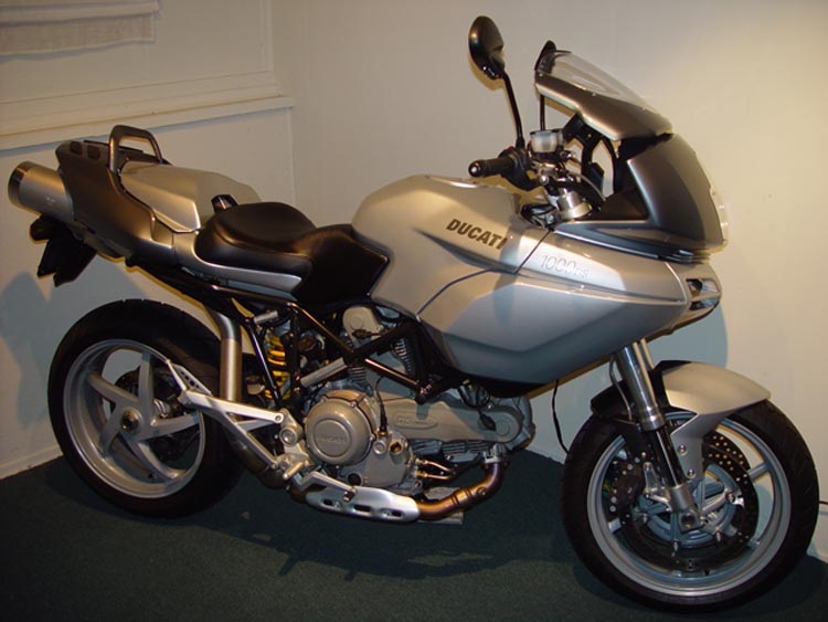 Custom seat and cowl with monster mirrors.